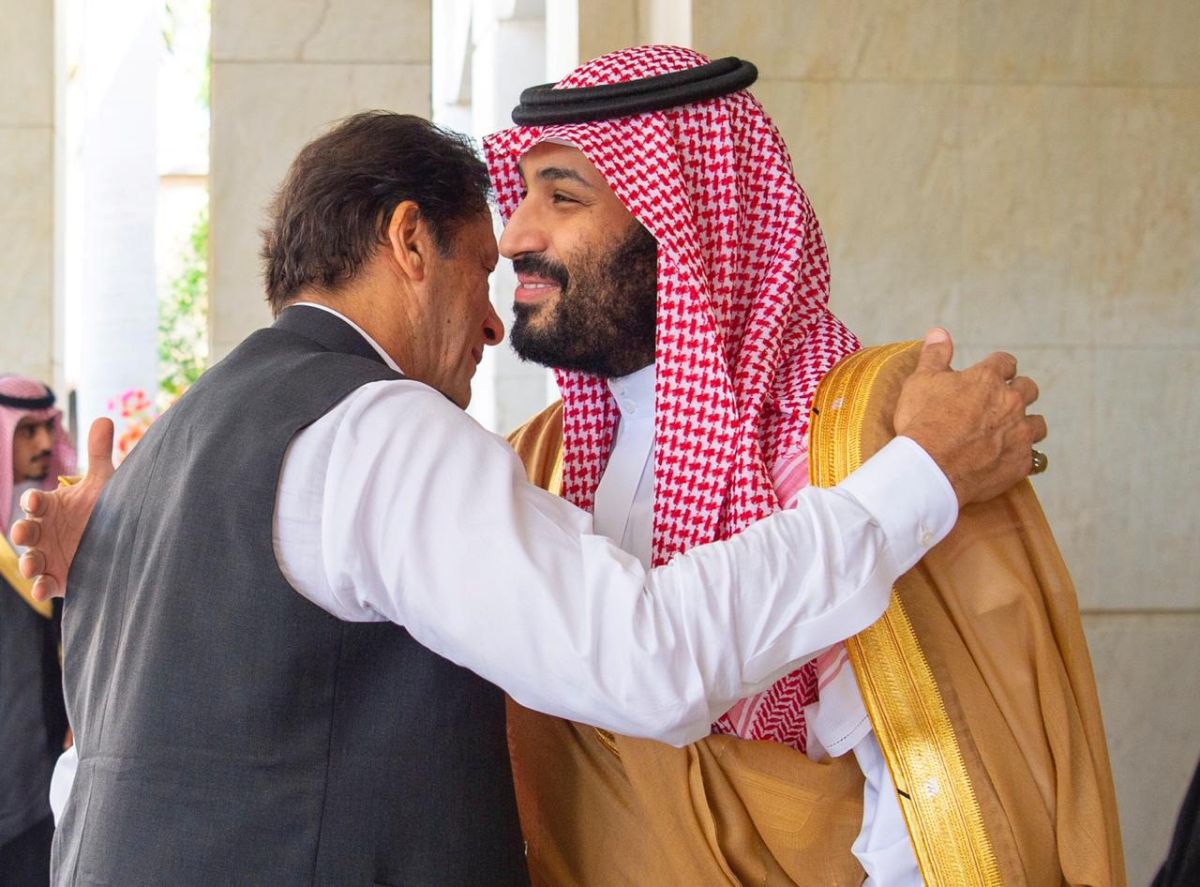 Pakistan's Prime Minister Imran Khan is welcomed by Saudi Arabia's Crown Prince Mohammed bin Salman in Jeddah